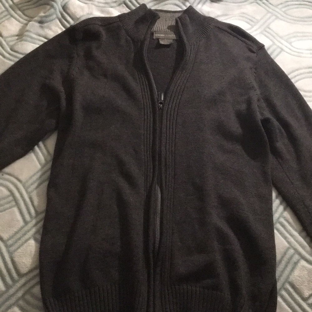 A dark grey sweater jacket